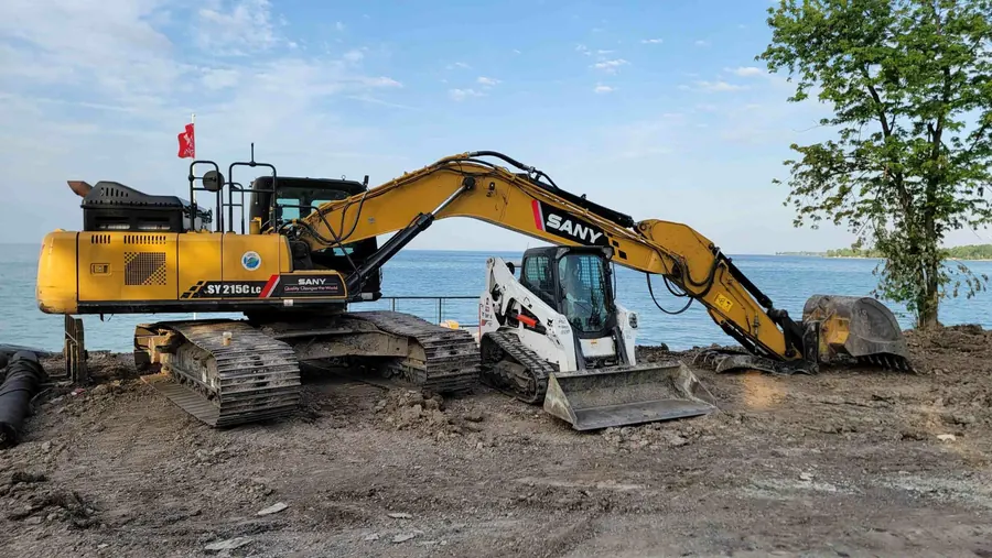 Excavator working on a driveway site