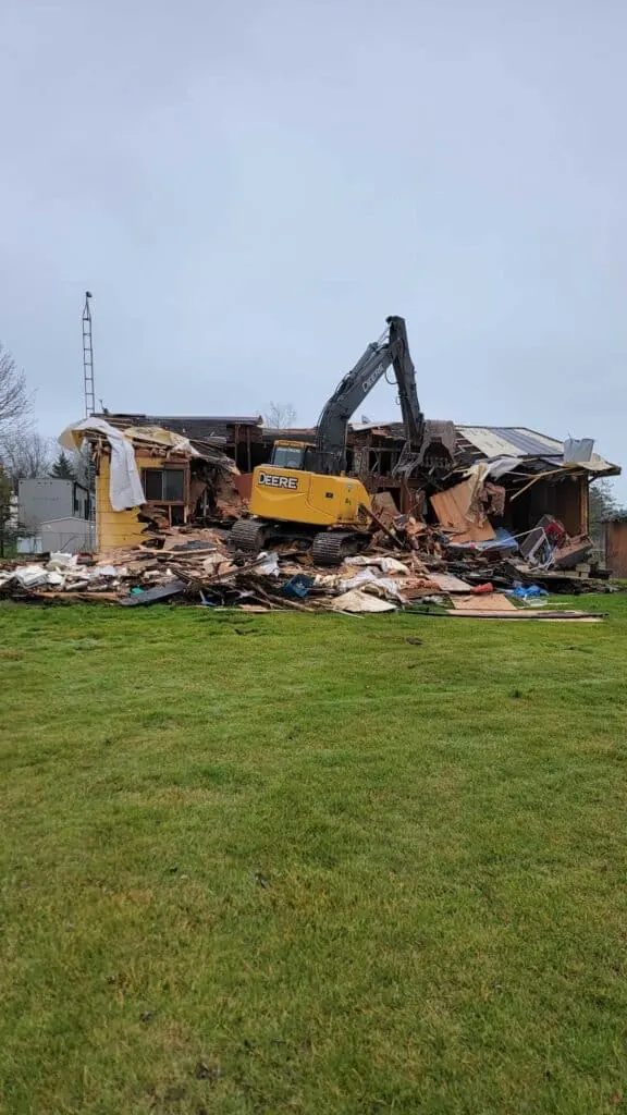 Excavator working on a demolition site